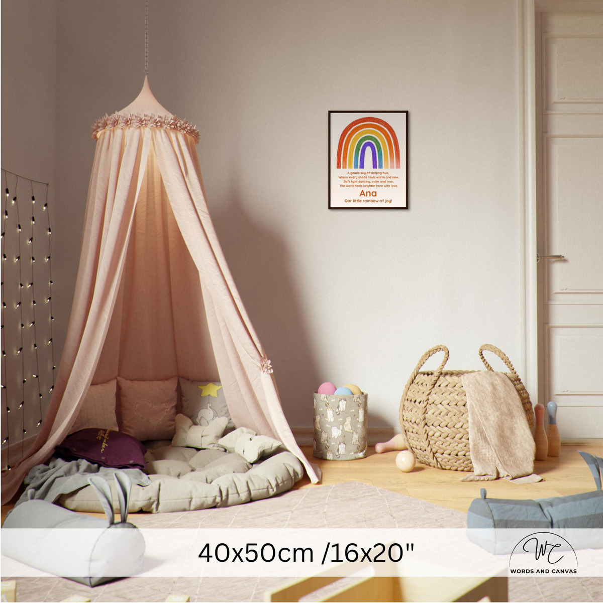 A pink canopy bed in a styled children's bedroom, with a floor cushion, pillows, a woven basket, and a framed rainbow wall print. Text at the bottom reads 40x50cm /16x20".