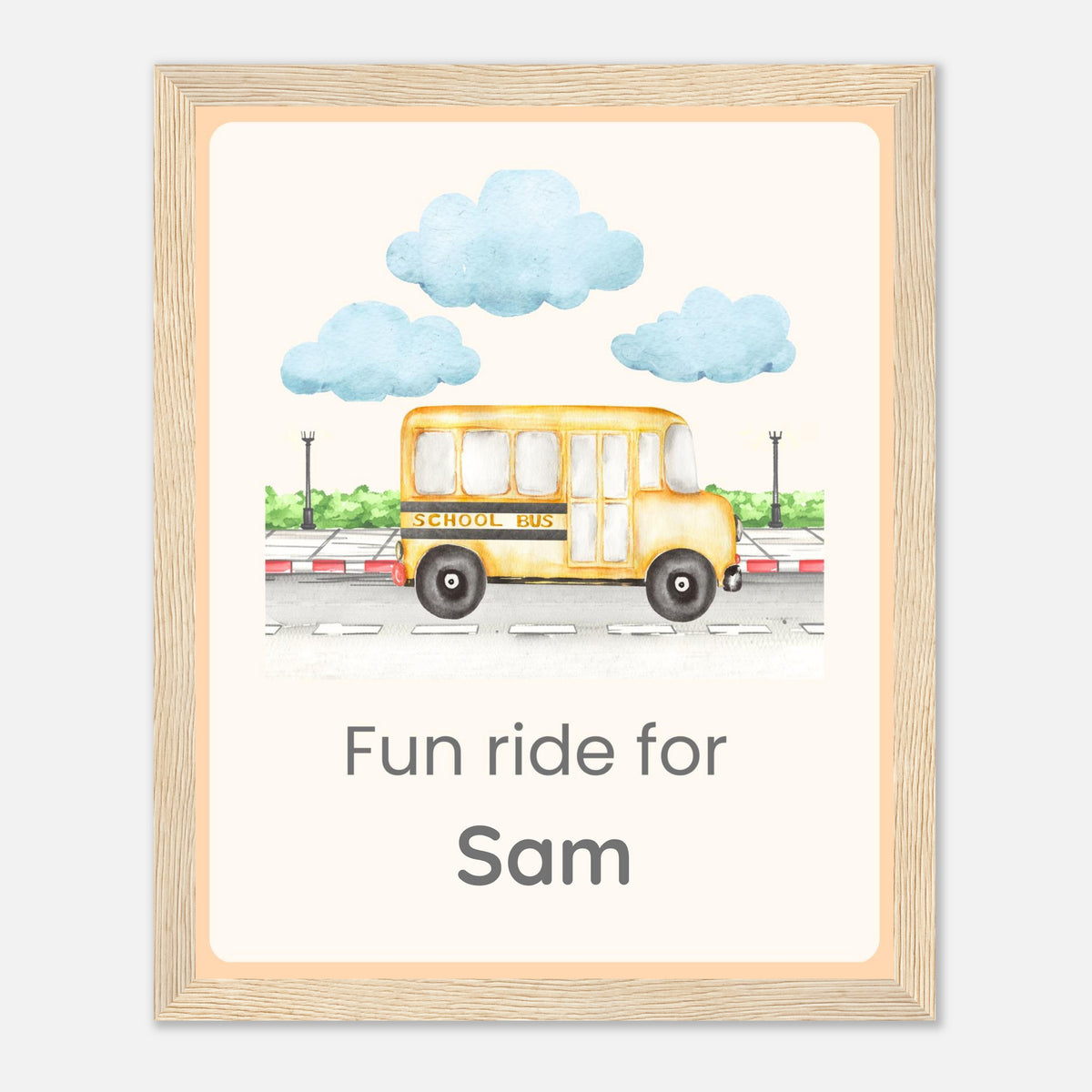 A personalized framed art print featuring a watercolor illustration of a yellow school bus with the text 'Fun ride for Sam' underneath, enclosed in a light wood frame.