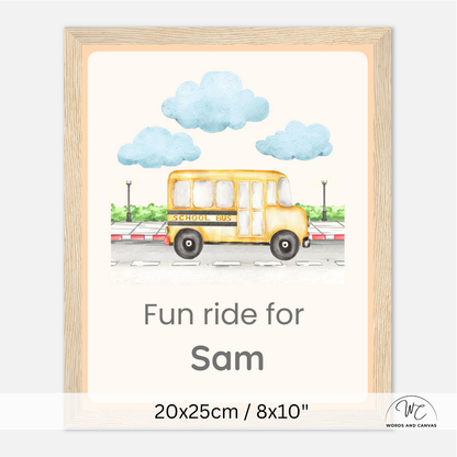 A personalized framed art print featuring a watercolor yellow school bus under three blue clouds, with the text 'Fun ride for Sam' and dimensions '20x25cm / 8x10"' shown on a white background.