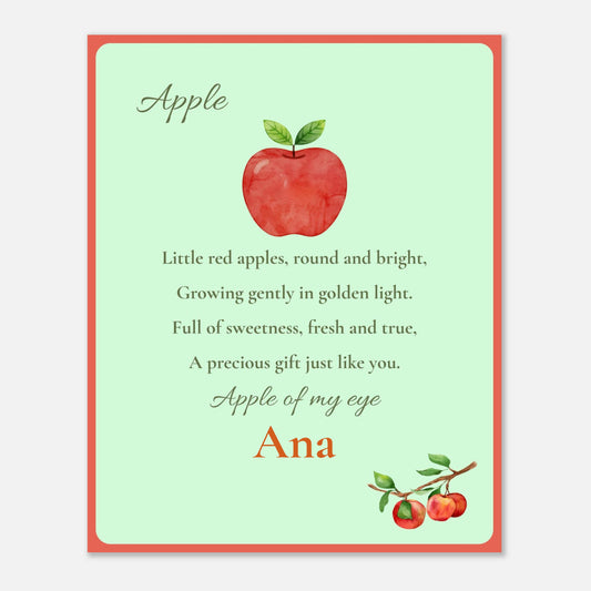 A personalized nursery print featuring a watercolor red apple with green leaves on a pale mint green background, bordered by a coral-red frame. With an apple poem.
