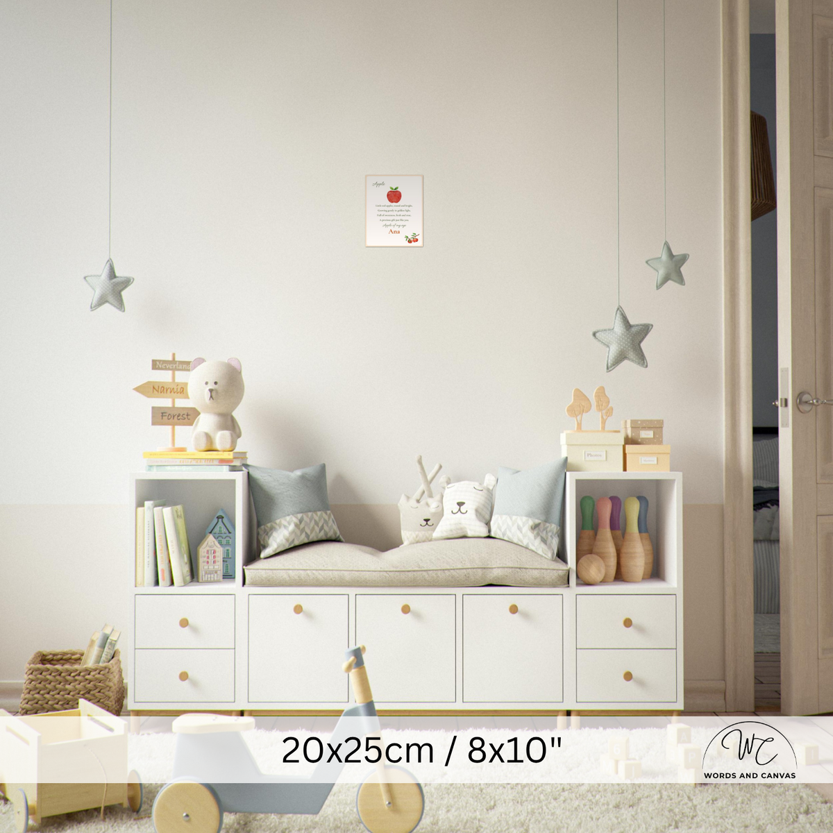 A styled children's room scene showing a white storage bench with open cubbies and drawers, decorated with pillows, books, toys, and hanging star ornaments. A text overlay at the bottom reads '20x25cm / 8x10"' with a small 'Woods and Canvas' logo in the corner.