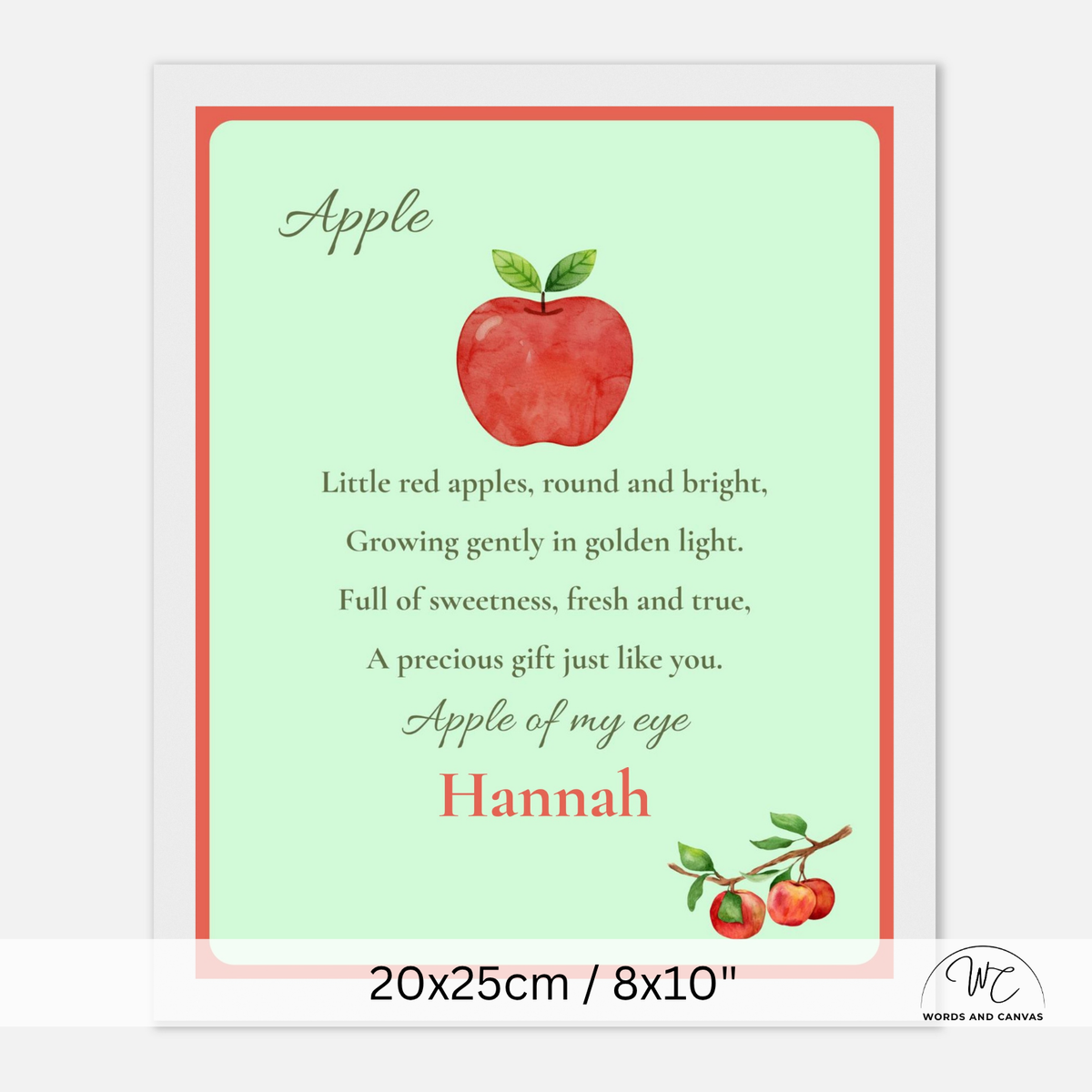 Personalized nursery wall art print featuring a watercolor red apple with green leaves on a pale mint green background, surrounded by a coral border. The print includes a poem about apples and the name 'Hannah' in red script, with dimensions '20x25cm / 8x10"' shown at the bottom.