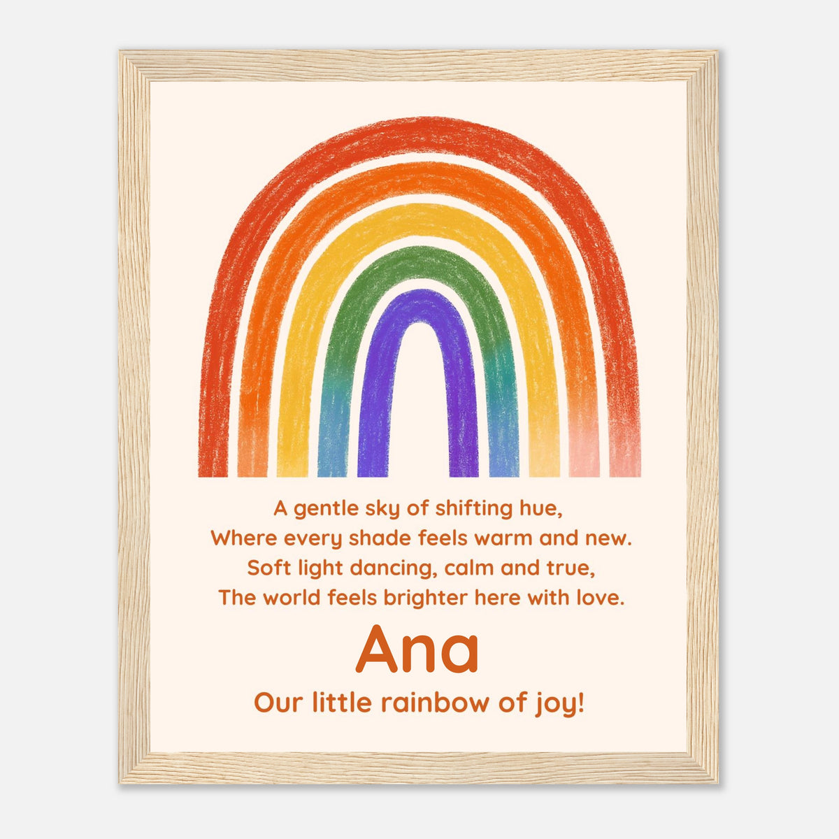 A personalized framed art print featuring a colorful rainbow and a nursery rhyme. The print has a cream background with a hand-drawn style rainbow in red, orange, yellow, green, blue, and purple.
