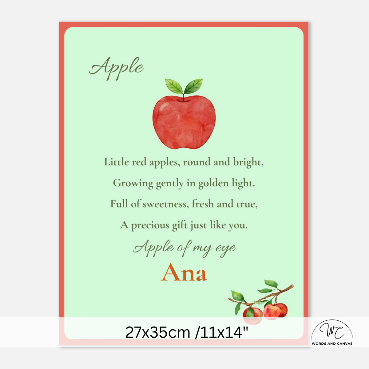 A personalized apple-themed nursery print with a watercolor red apple, a poem about apples, and the name 'Ana' in script. The print has a coral border, a pale mint green background, and is shown with a size label of 27x35cm / 11x14" at the bottom.