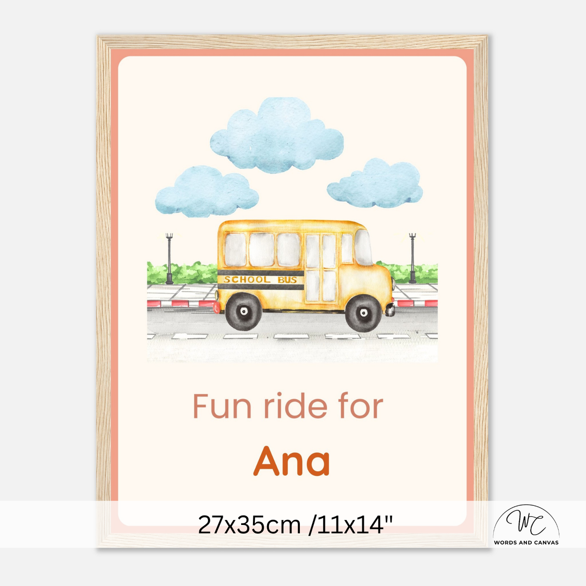 A personalized children's art print featuring a watercolor yellow school bus under blue clouds, with the text 'Fun ride for Ana' and dimensions '27x35cm /11x14"' shown below the framed print.