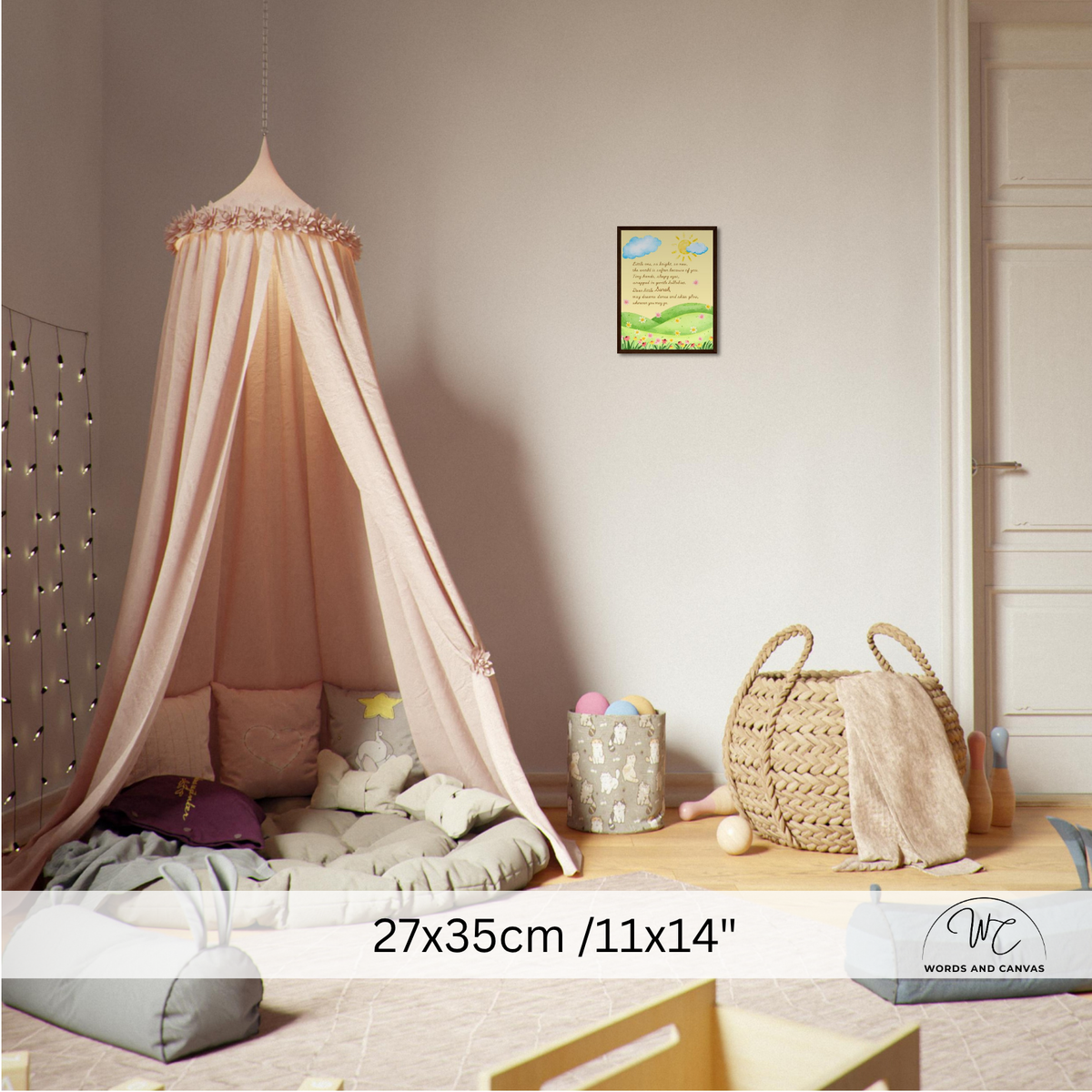 A pink canopy bed with sheer fabric draped over cushions in a child's bedroom. The room includes a wooden floor, woven basket, string lights, and a size overlay at the bottom reading 27x35cm /11x14".