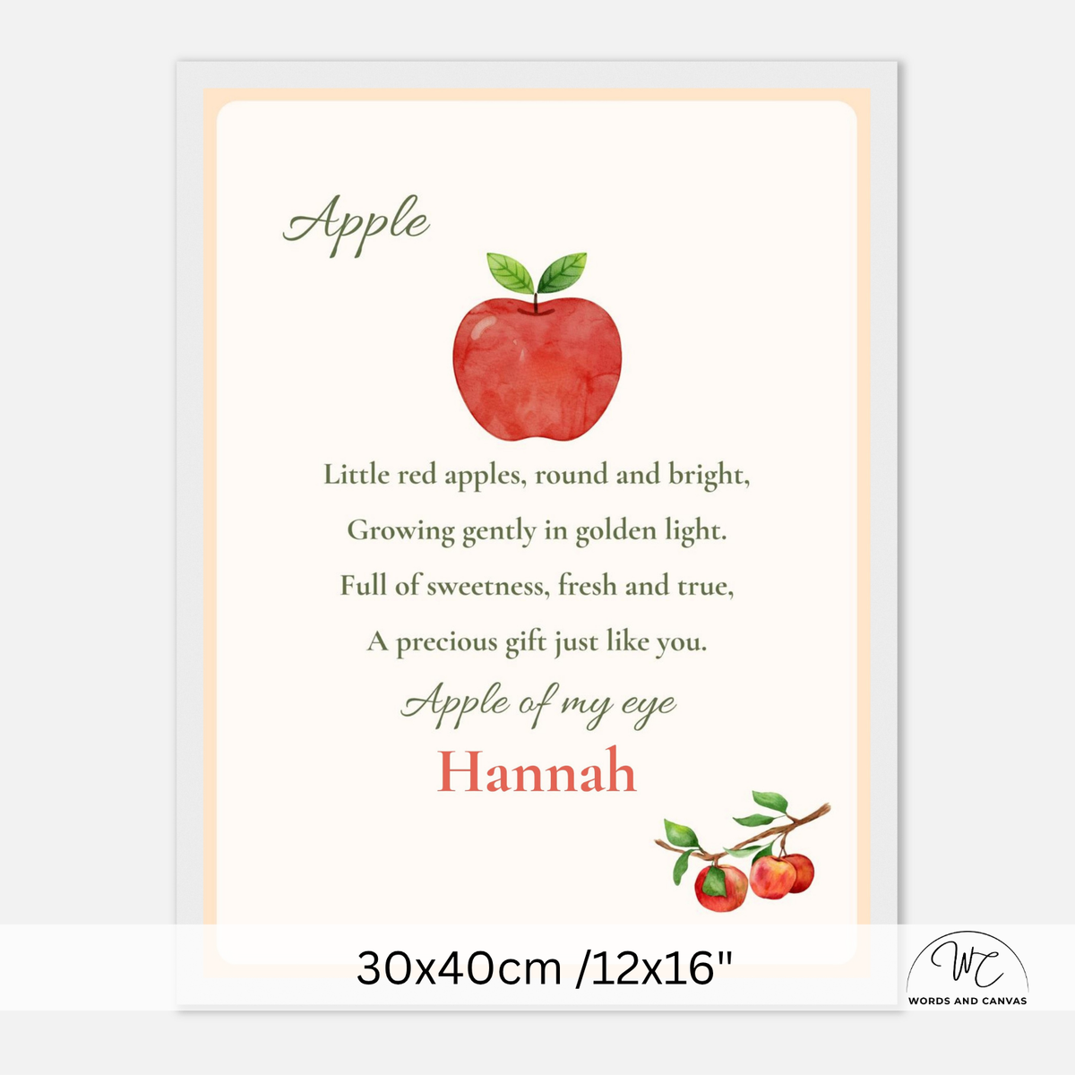 A personalized nursery print featuring a watercolor red apple with green leaves, a poem about apples, and the name 'Hannah' in red script. The print is shown with a white border and a size label at the bottom indicating 30x40cm /12x16".