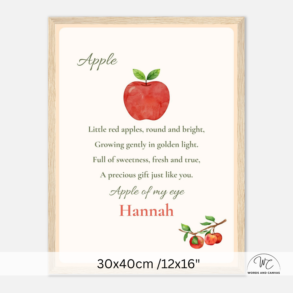 Personalized wooden-framed apple-themed nursery wall art featuring a watercolor red apple, poem text, and the name Hannah in red script, shown on a light gray background with size text at the bottom.
