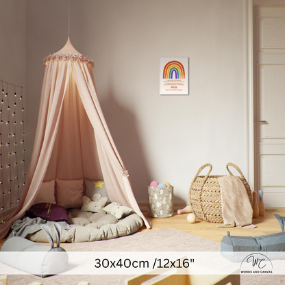 A nursery room scene showing a small wall art print of a rainbow with the text