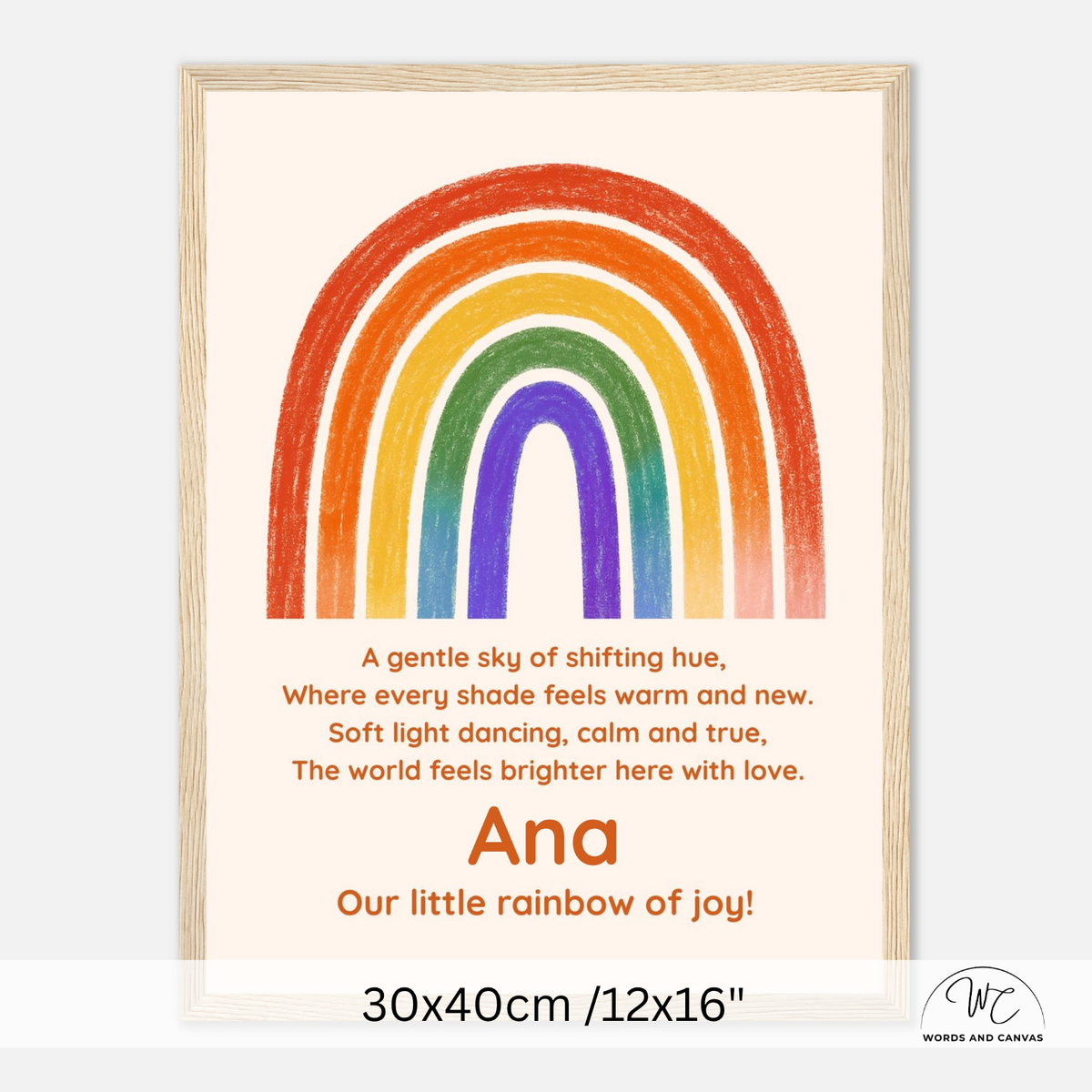 Personalized children's wall art print featuring a colorful rainbow on a warm cream background with a poem and the name 'Ana' in orange. The print is shown in a light wood frame, with size text '30x40cm /12x16"' below.