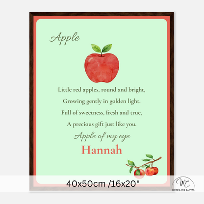 Personalized framed apple-themed nursery wall art featuring a watercolor red apple, the word 'Apple,' a poem, and the name 'Hannah' in coral text, shown with a dark wood frame and size overlay.