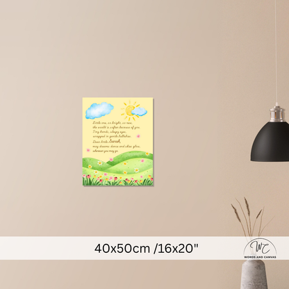 A small wall art print with a yellow sky, blue clouds, a smiling sun, green hills, and a poem is displayed on a beige wall. A black pendant lamp hangs on the right, and a vase with dried stems sits below.
