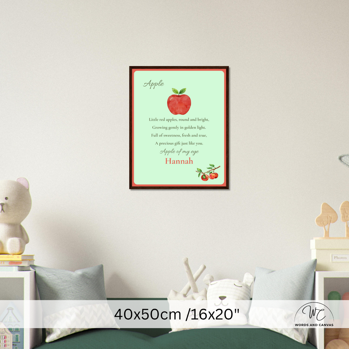 A personalized apple tree poem framed wall art print with a red apple illustration and the name 'Hannah' at the bottom, displayed on a light beige wall above a bed in a styled bedroom setting. A '40x50cm /16"x20"' size overlay is at the bottom.