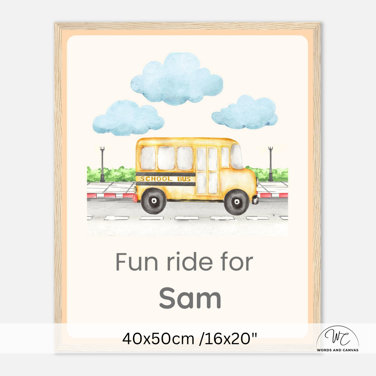 Personalized school bus canvas print in a light wood frame, featuring a yellow school bus, blue clouds, and the text 'Fun ride for Sam' with dimensions '40x50cm /16x20"' at the bottom.