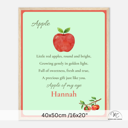 Personalized framed apple-themed nursery wall art featuring a watercolor red apple, the word 'Apple,' a poem, and the name 'Hannah' in coral and green text on a pale mint background, with a light wood frame and size 40x50cm text at the bottom.