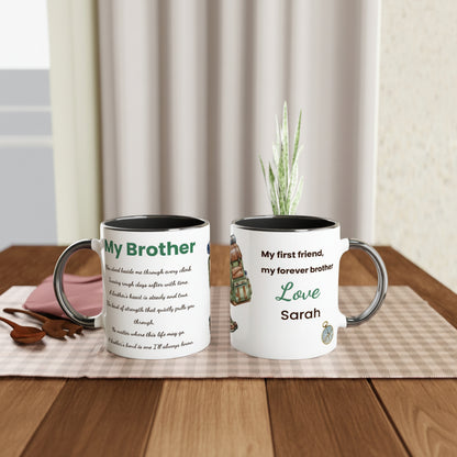 Two personalized ceramic mugs displayed side-by-side on a wooden table runner. The left mug is white with a black interior and handle, featuring a green title 'My Brother' and a black printed poem.