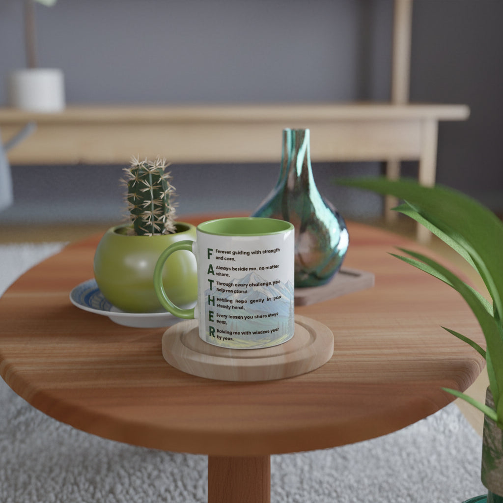 A ceramic mug with a green interior and black typographic text sits on a round wooden coaster on a light wood table, styled in a cozy room setting with a small potted cactus and a metallic vase in the background.
