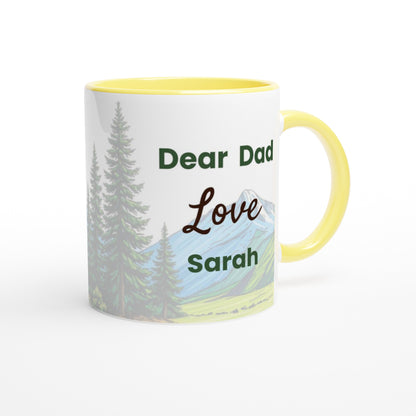 A white ceramic mug with a yellow interior and handle, featuring a printed design of pine trees, mountains, and the text 'Dear Dad Love Sarah'.