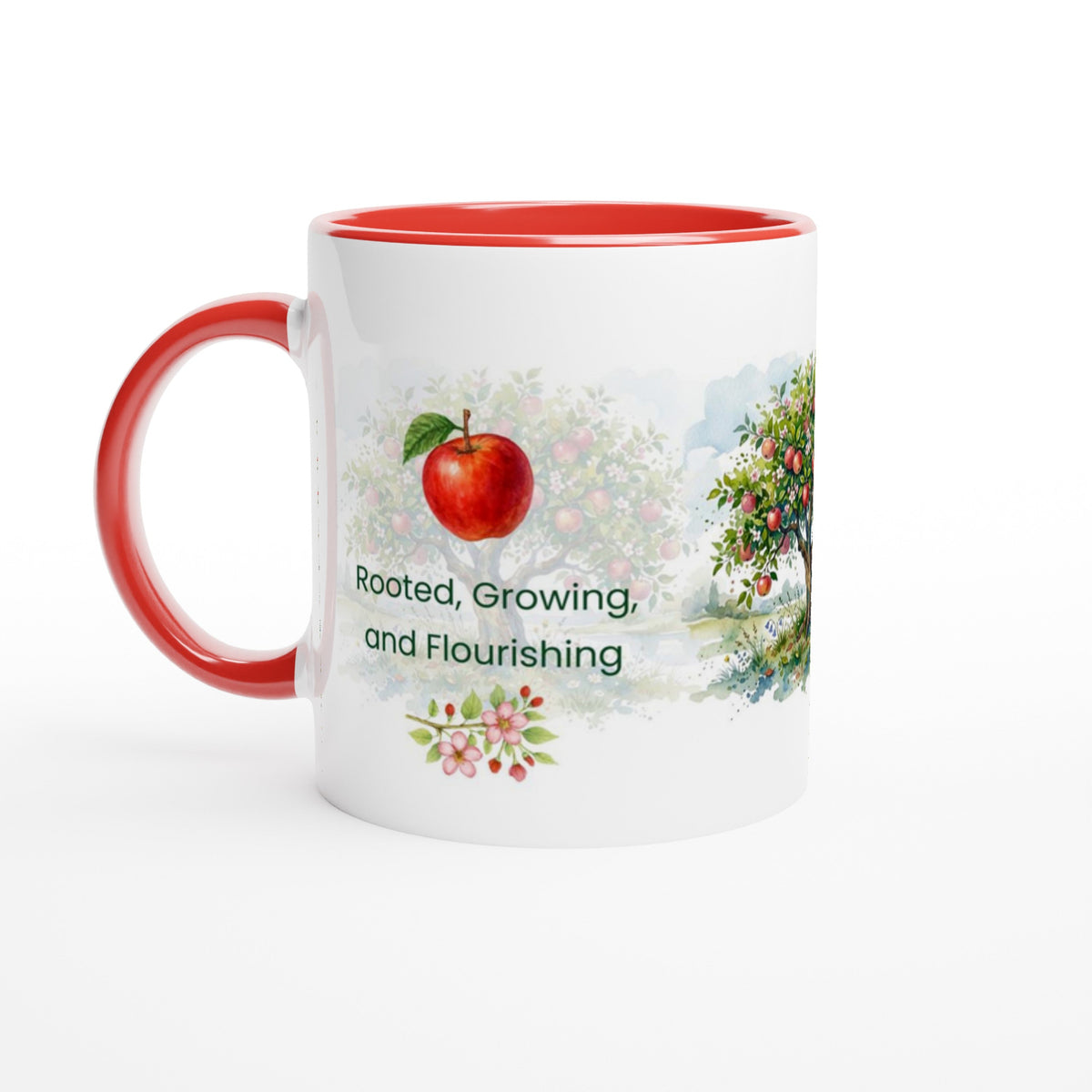 A white ceramic mug with a red interior and red handle, featuring a printed illustration of a red apple, green foliage, and the text 'Rooted, Growing, and Flourishing'.