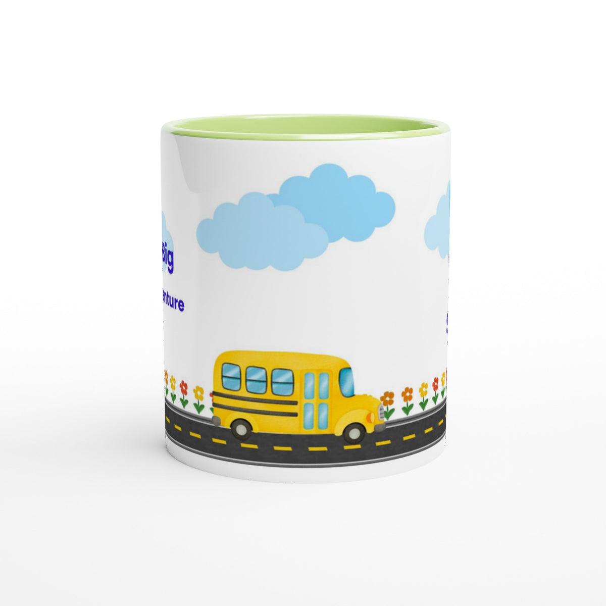 A white ceramic mug with a yellow interior, featuring a cartoon illustration of a yellow school bus on a road with blue clouds and flowers.