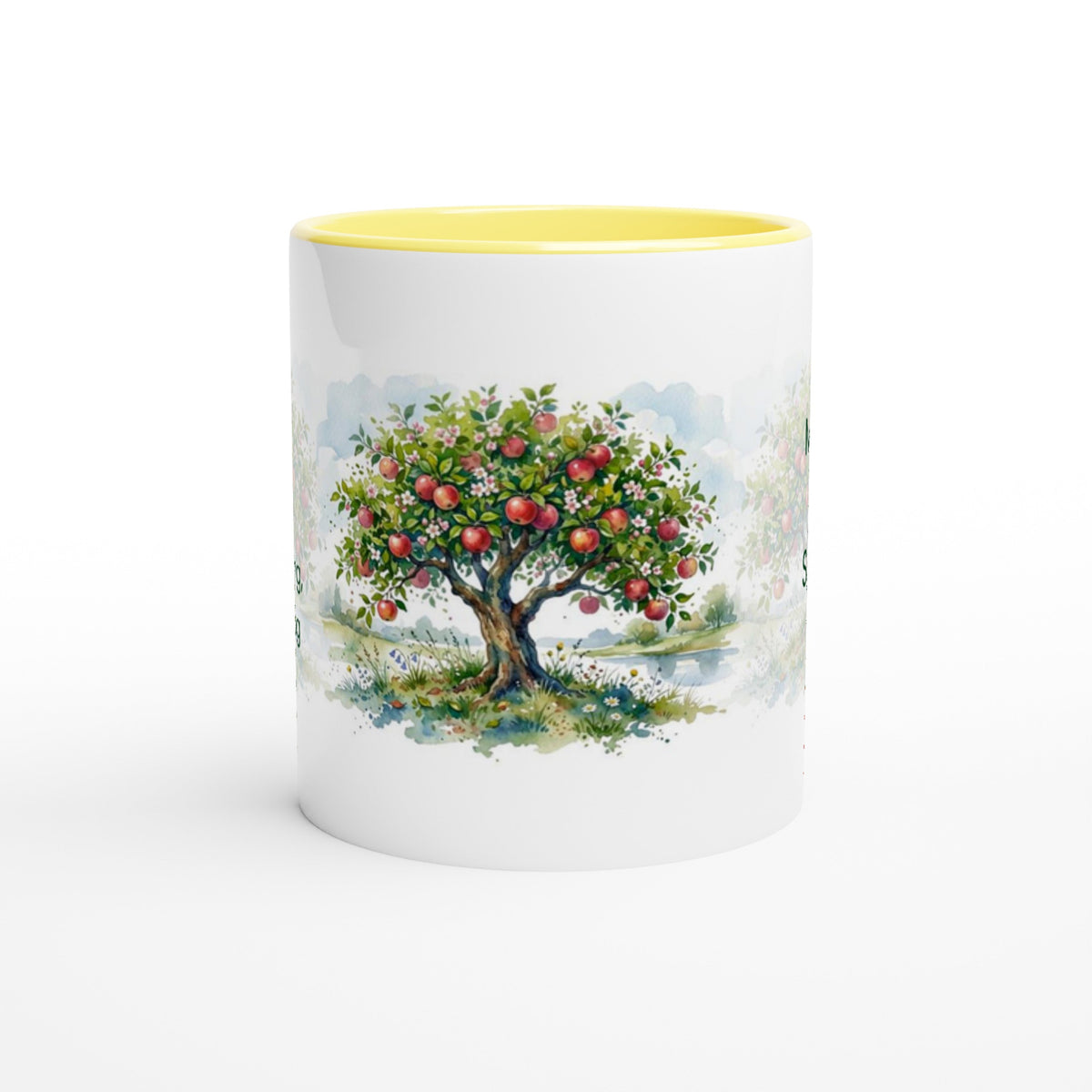 A white ceramic mug with a bright yellow interior, featuring a printed watercolor illustration of an apple tree with red apples on the front.