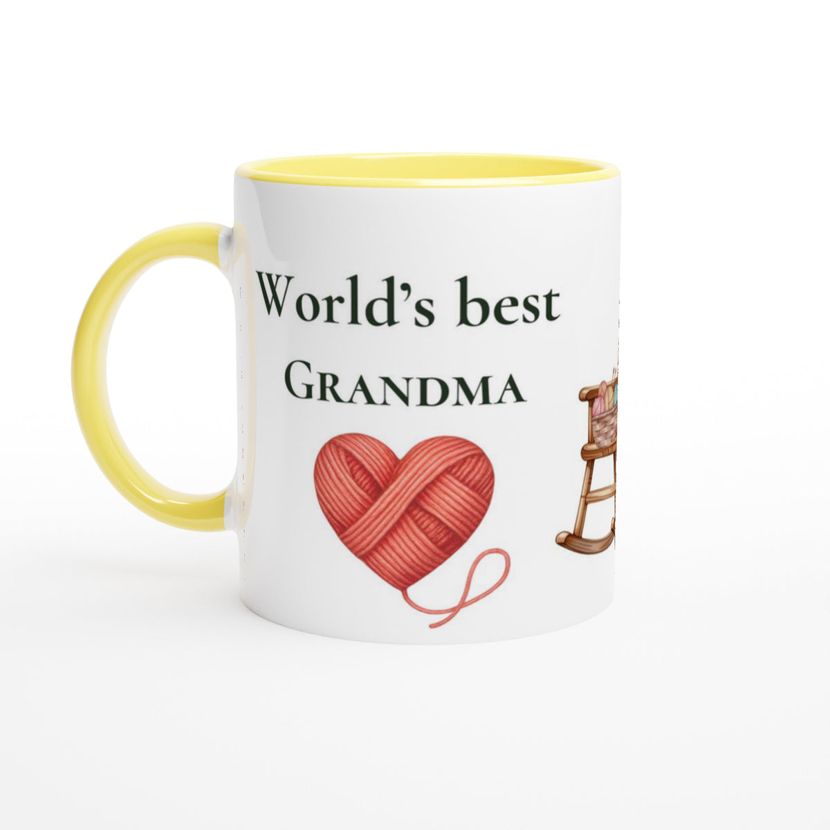 A white ceramic mug with a yellow interior and handle, printed with the text 'World's best GRANDMA' in black, a red heart-shaped yarn ball, and a small rocking chair illustration.