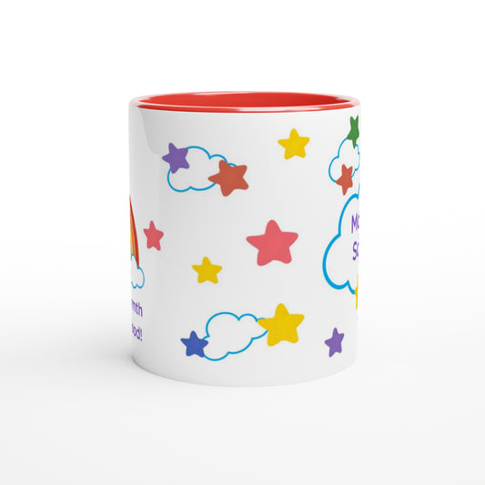 A white ceramic mug with a red interior, decorated with colorful cartoon stars and clouds, on a clean white background.