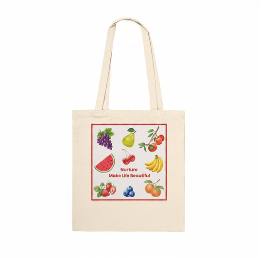 A natural canvas tote bag with dual shoulder straps, featuring a colorful fruit illustration and the text 'Nurture Make Life Beautiful' printed on the front, set against a plain white background.