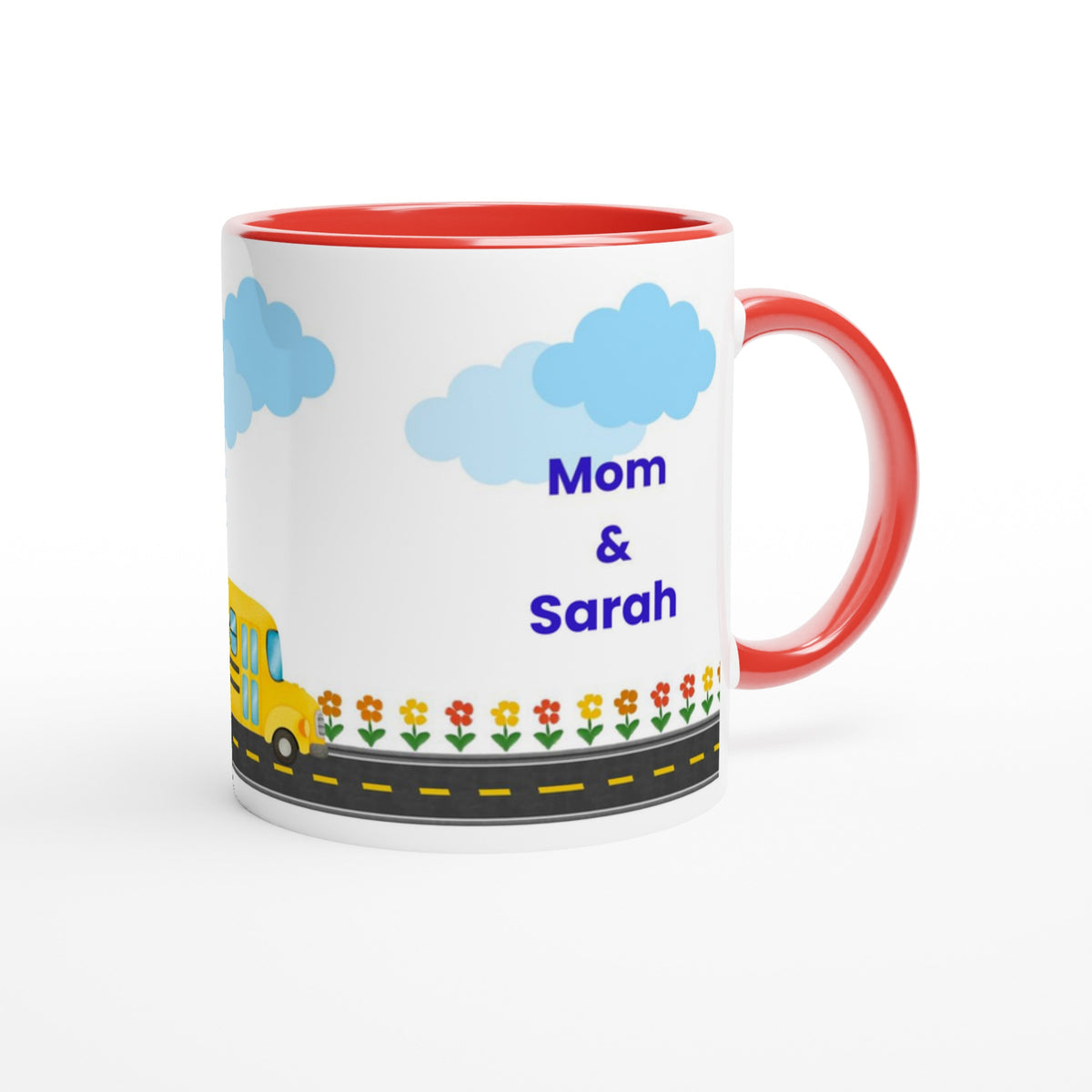 A white ceramic mug with a red interior and handle, decorated with a cartoon school bus, flowers, a road, and the text 'Mom & Sarah' in blue, shown on a white background.