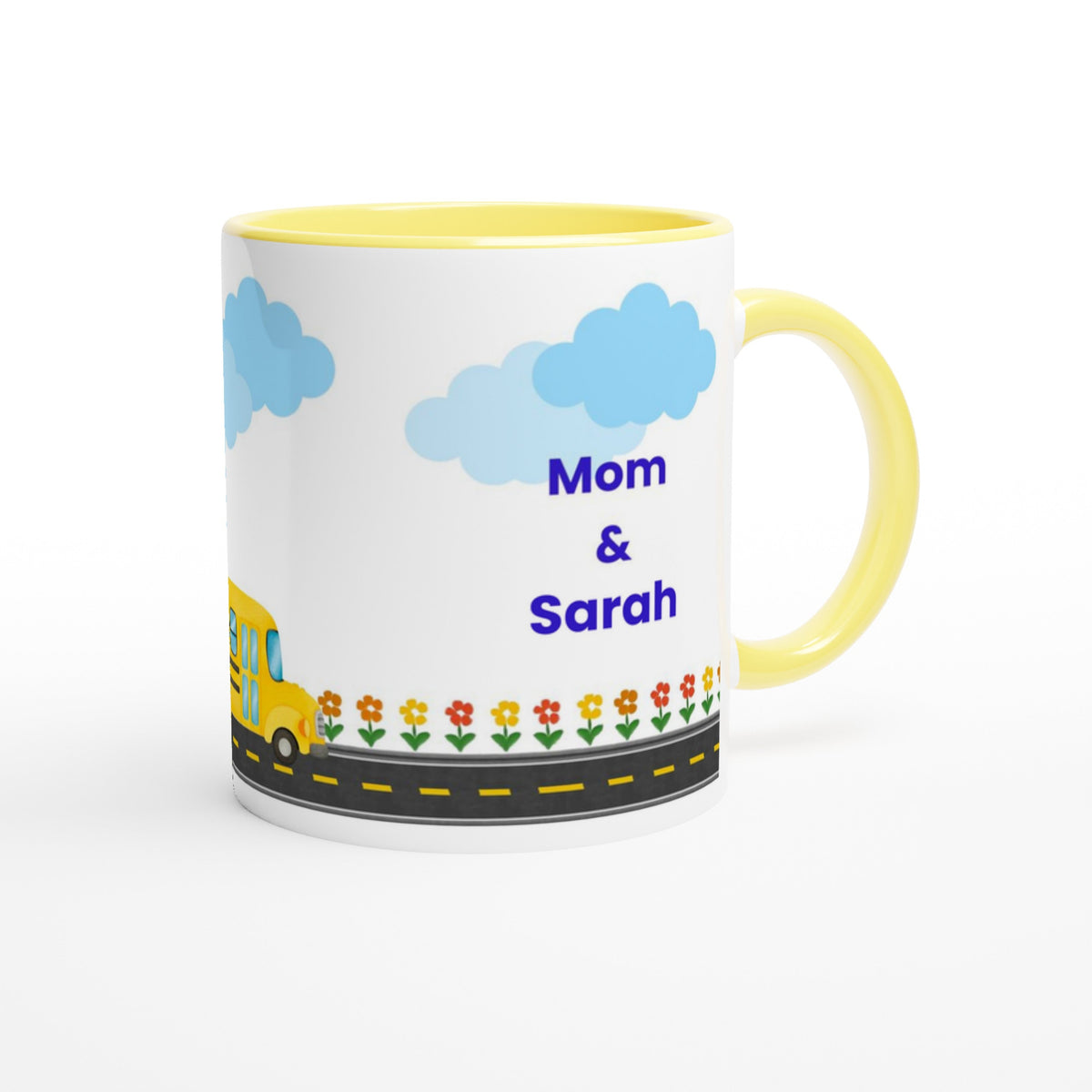 A white ceramic mug with a yellow handle and yellow interior, decorated with a school bus, blue clouds, a flower border, and the text 'Mom & Sarah' in blue, shown on a white background.