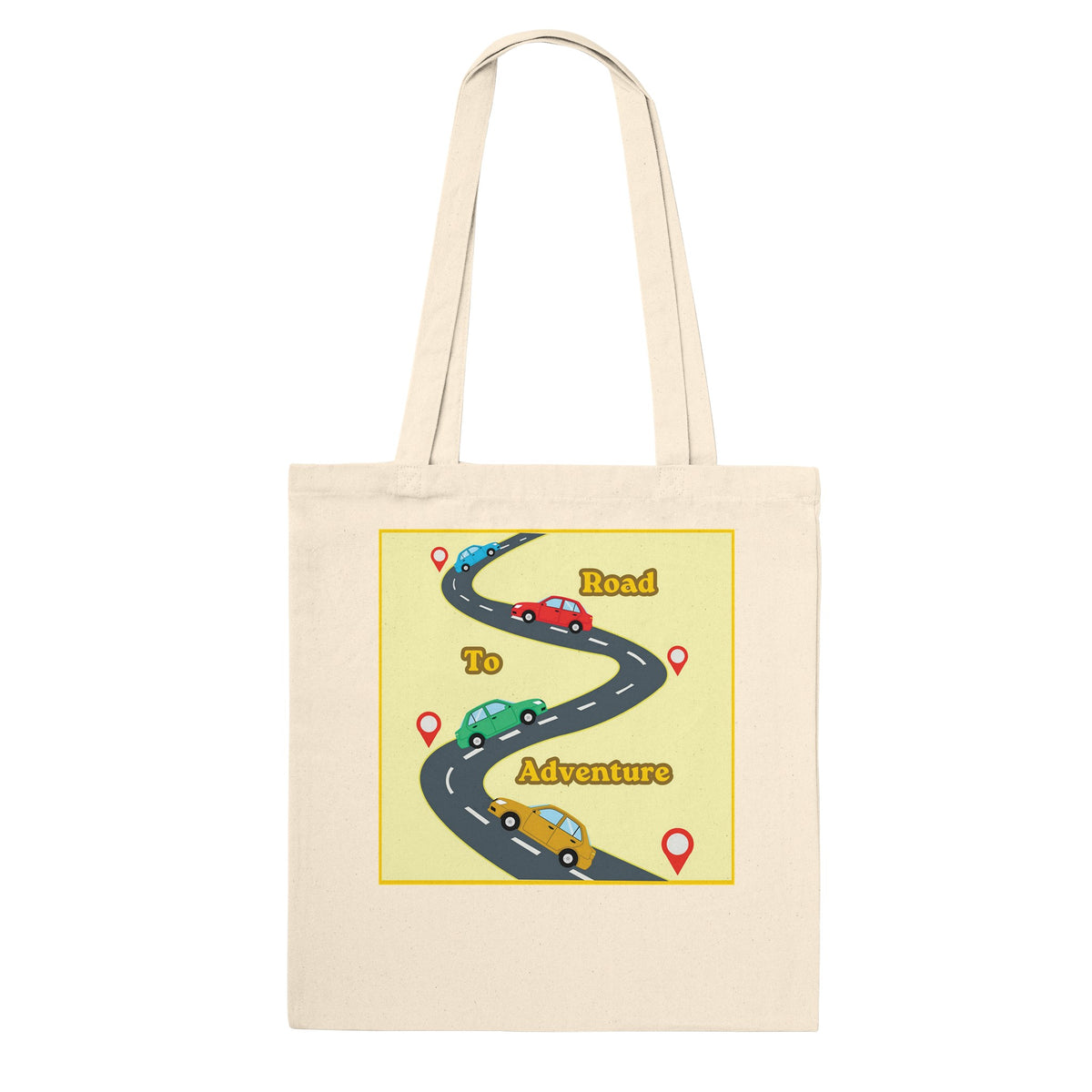 A cream-colored canvas tote bag with a printed graphic on the front showing a winding road labeled 'Road To Inspiration' with cartoon cars and red map pins, set against a plain white background.