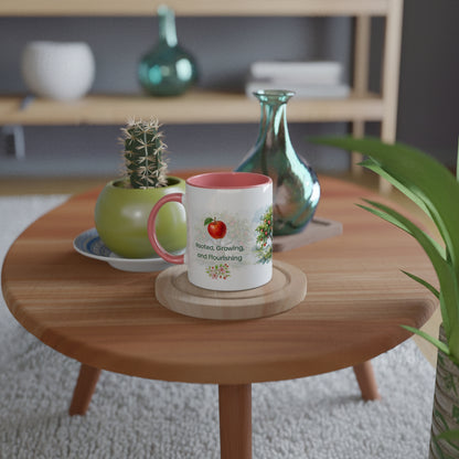 A white ceramic mug with a pink interior and handle