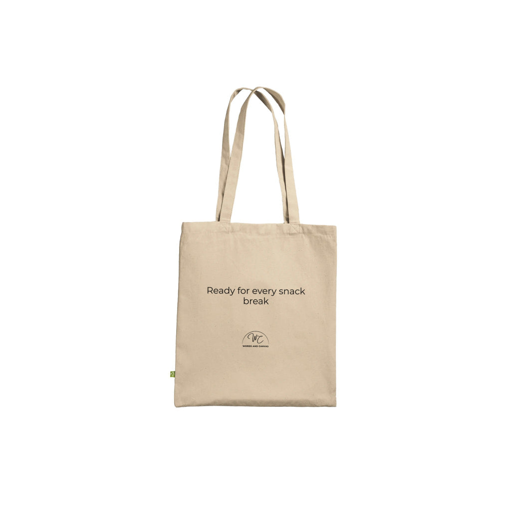 A beige canvas tote bag with two shoulder straps